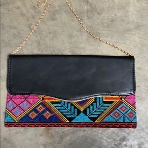 Hand embroidered faux black leather bag